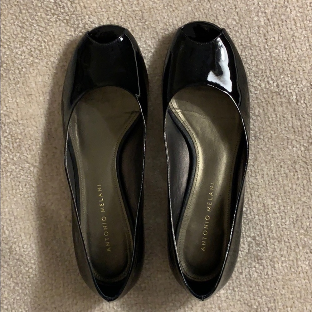 Black ,patent leather .peep toe flats